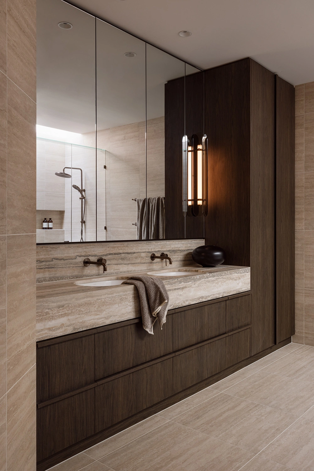 Custom lounge shelving with timber cabinetry and integrated LED lighting