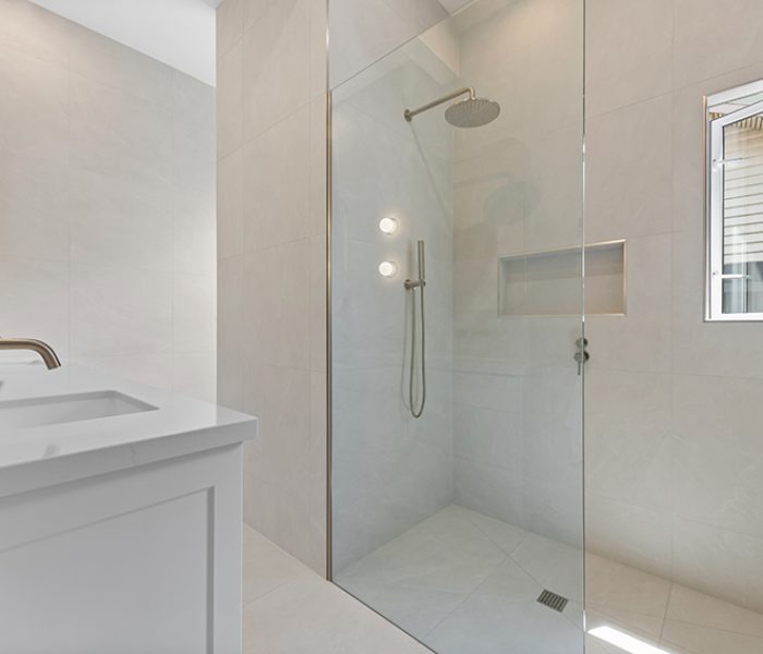 A frameless shower screen in a modern bathroom